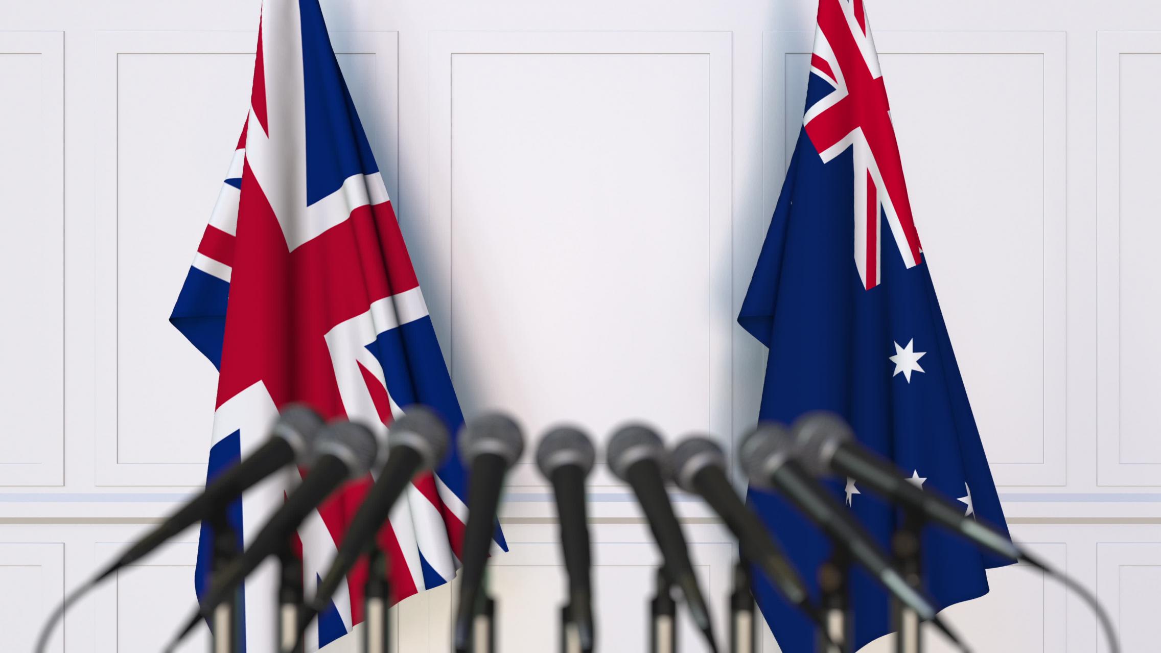 UK AUS flags podium